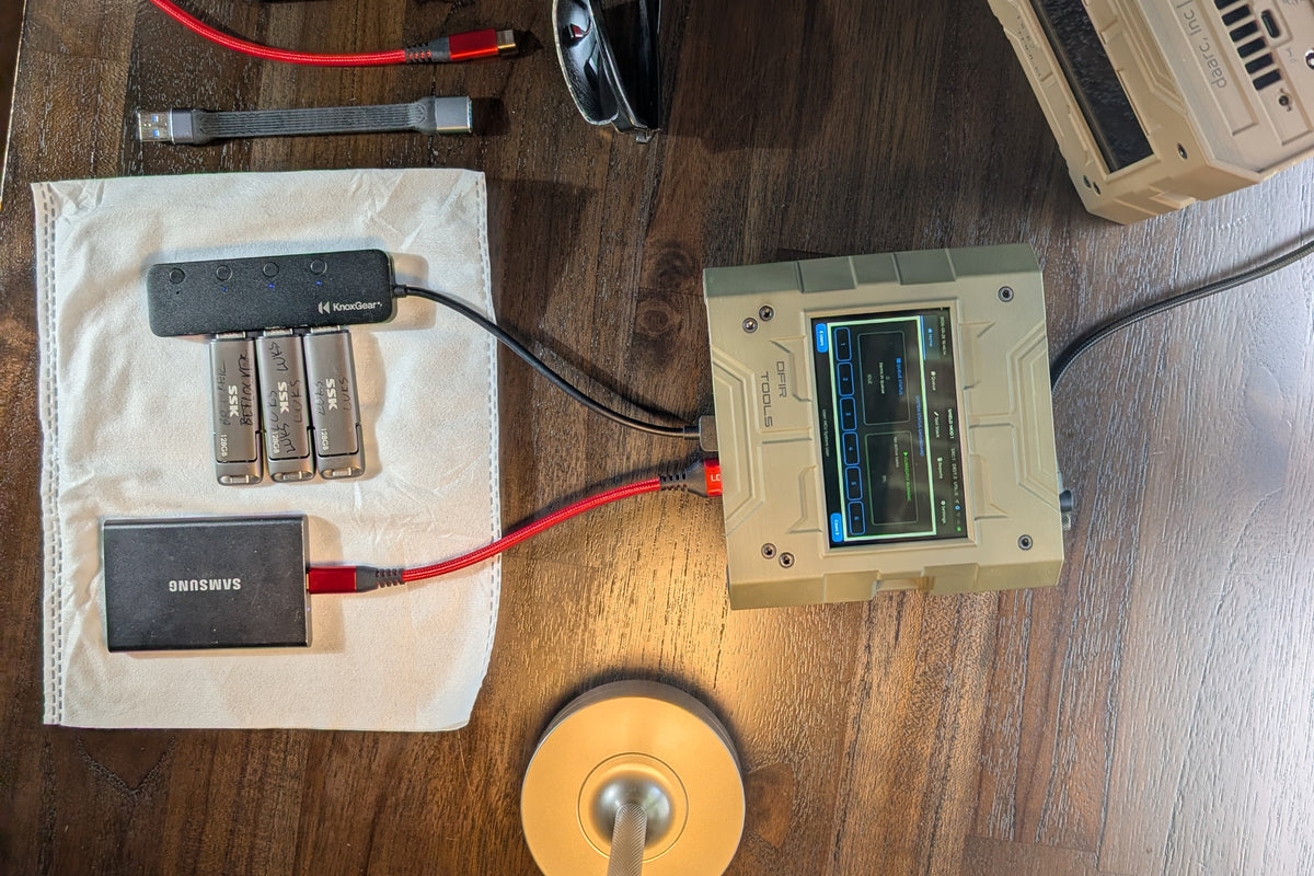 Shadow and Shield forensic imager connected to several destination drives on a worktable