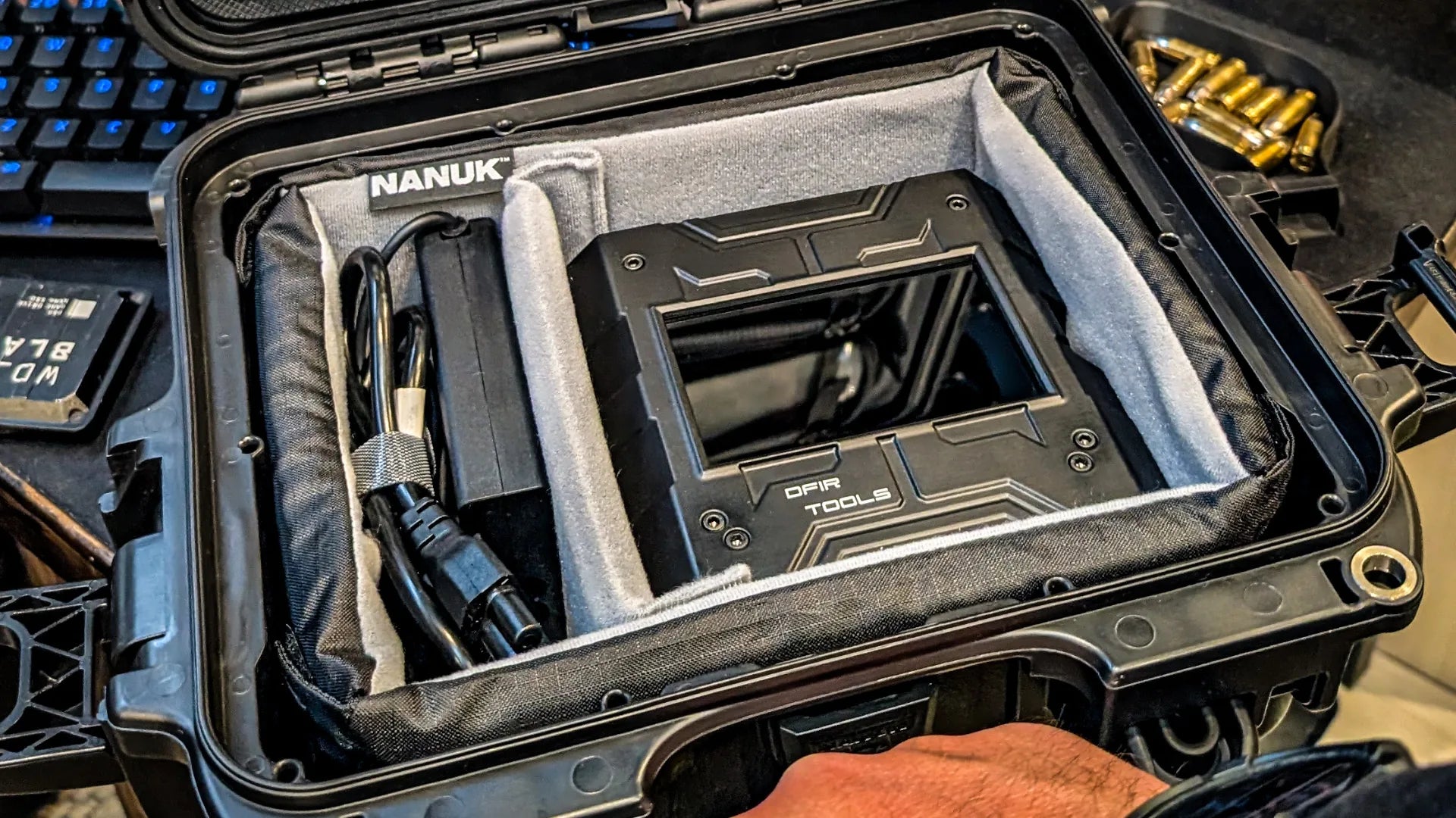 Shield-399 secured in an open Nanuk 905 case with padded dividers