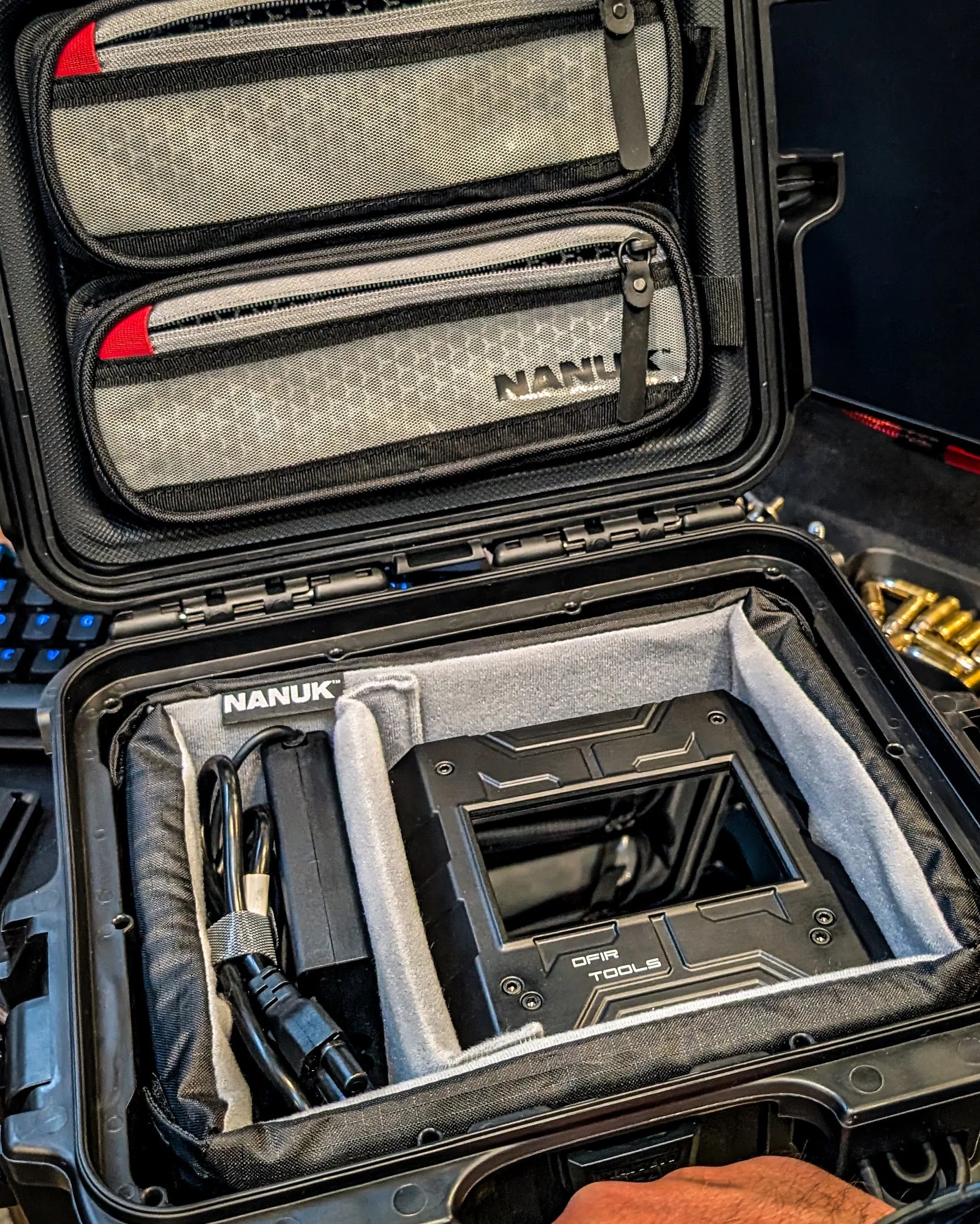 Nanuk lid organizer installed inside an open case with a Shield-399 unit